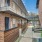 a brick building with a walkway
